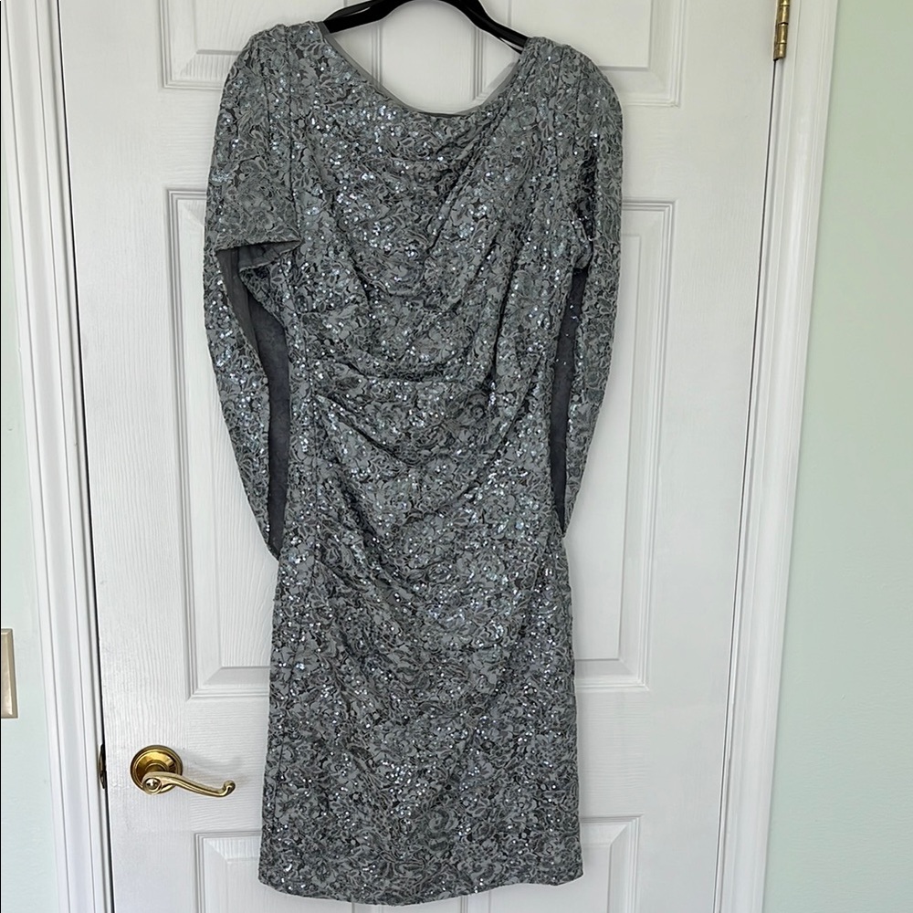 Elegant Betsy & Adam fully lined silver cocktail dress with built in sash.